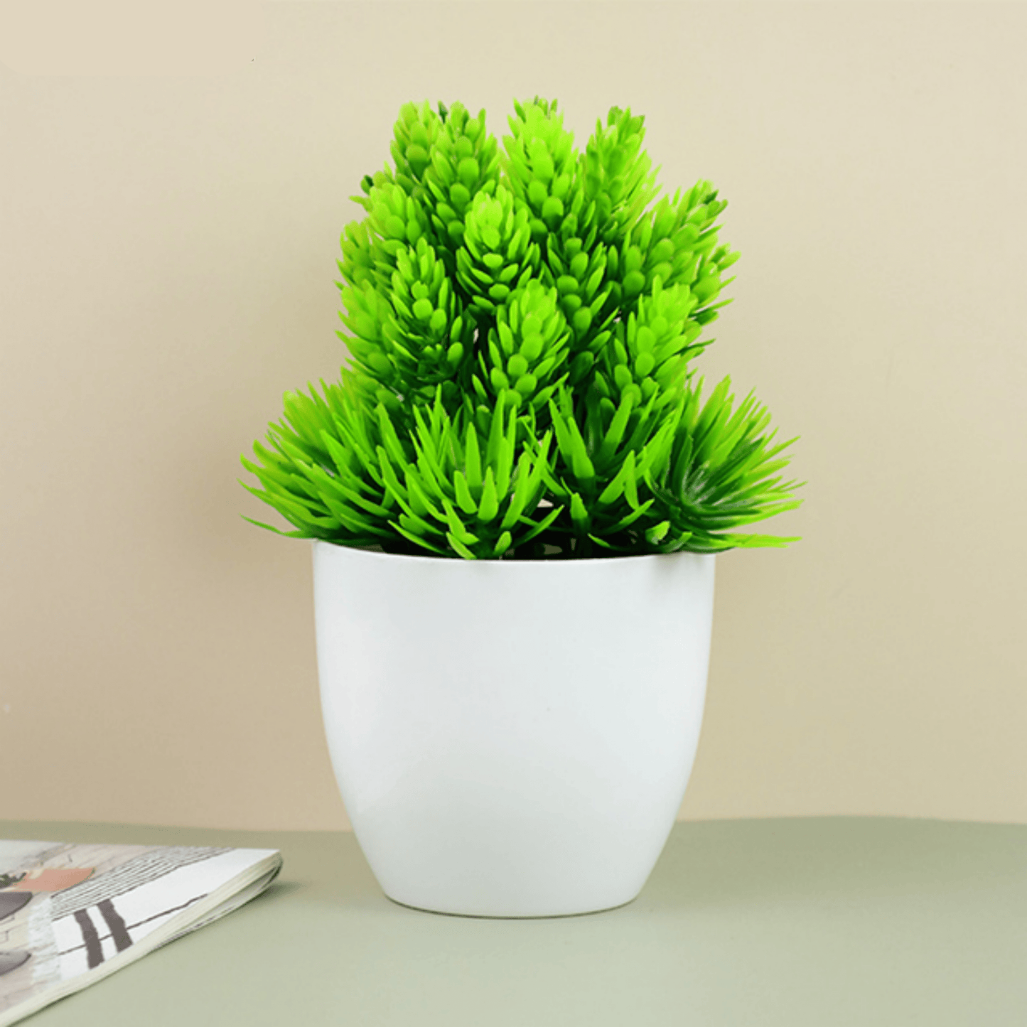 Kunststoffpflanze in hochwertiger Vase